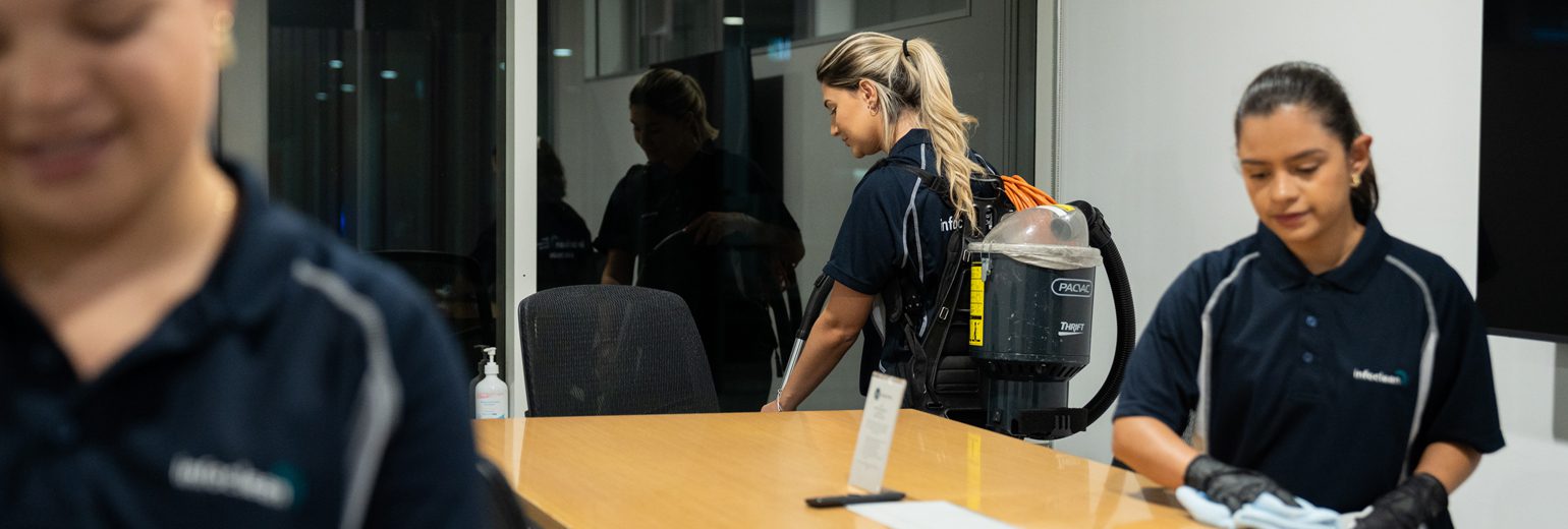 Infoclean cleaner working in a Brisbane office